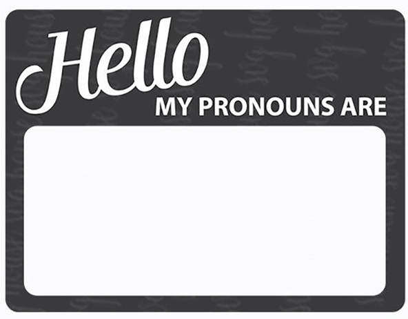 Nametag reads "Hello, my pronouns are . . ."