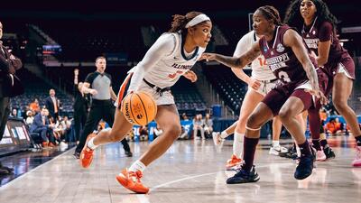Illinois guard Makira Cook drives with the ball in a game against Mississippi State