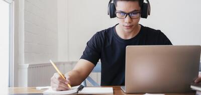 Getty Images stock shot of young man studying online