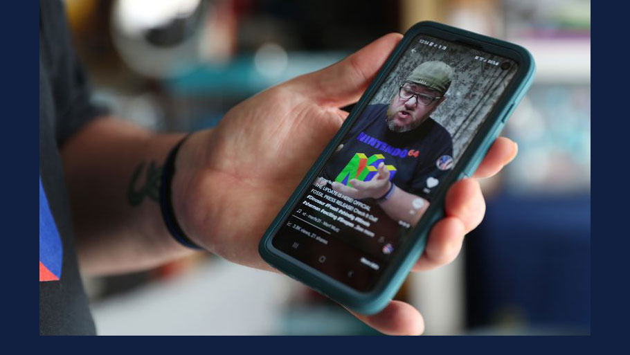 Ryan "Merf" Murphy displays a TikTok video he created to explain that a previous TikTok video he made that went viral was actually a joke. (John J. Kim / Chicago Tribune)