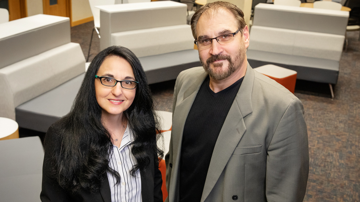 U. of I. psychology professors Sanda Dolcos, left, and Florin Dolcos used animated avatars to study how nonverbal cues influence cooperation and decision-making.  Photo by L. Brian Stauffer