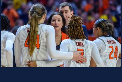 Coach Shauna Green speaks to players during a time out