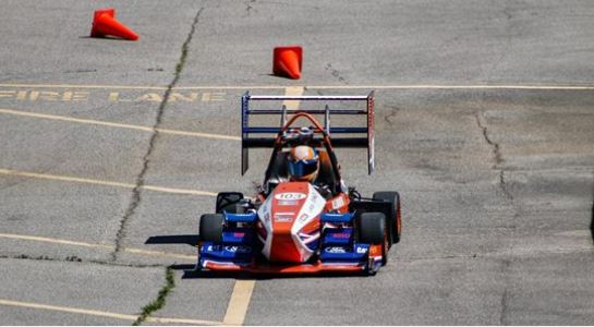 U of I's Formula SAE race car cruises down the track