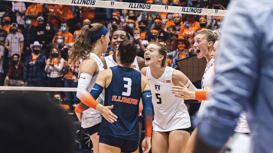 Illini setter Diana Brown central in a photo of team's on-court celebration
