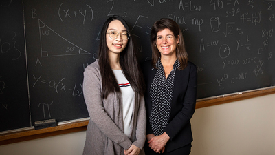 psychology professor Eva Pomerantz (right) and graduate student Jiawen Wu.  Photo by Michelle Hassel