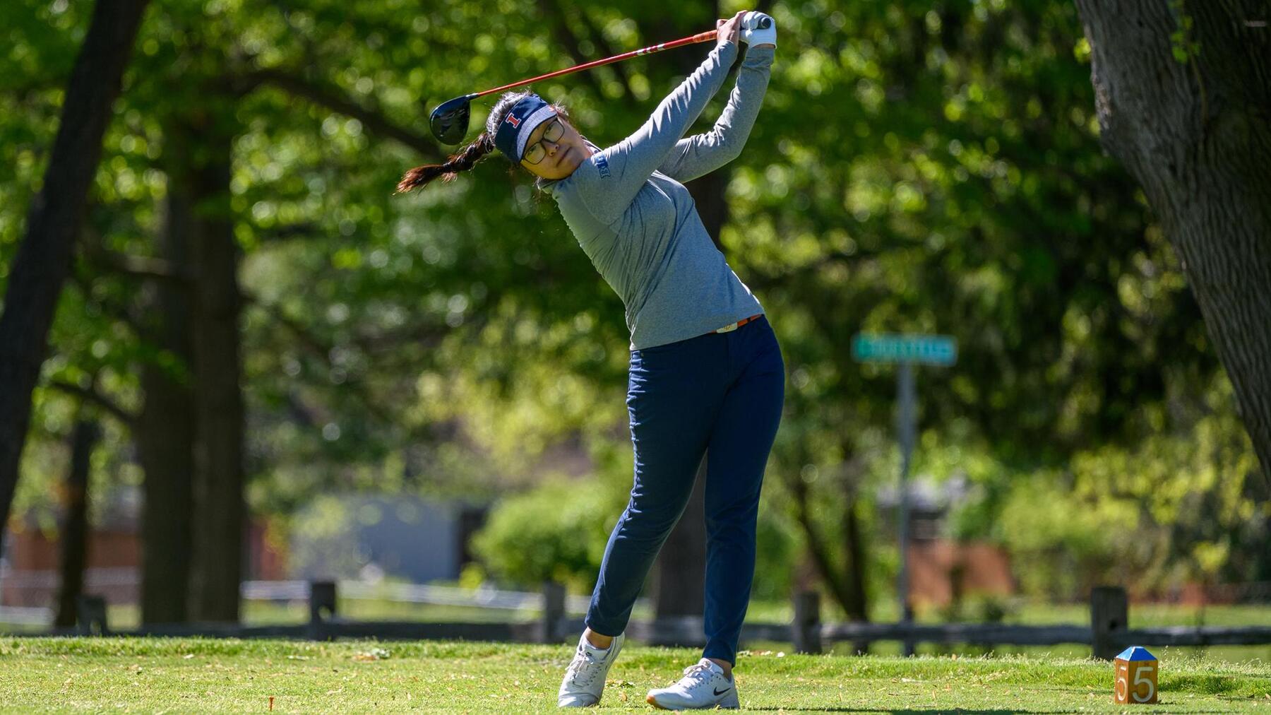Junior golfer Chrystal Wang tees off