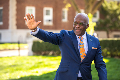 Chancellor Robert Jones waives to students on the Main Quad. U of I photo