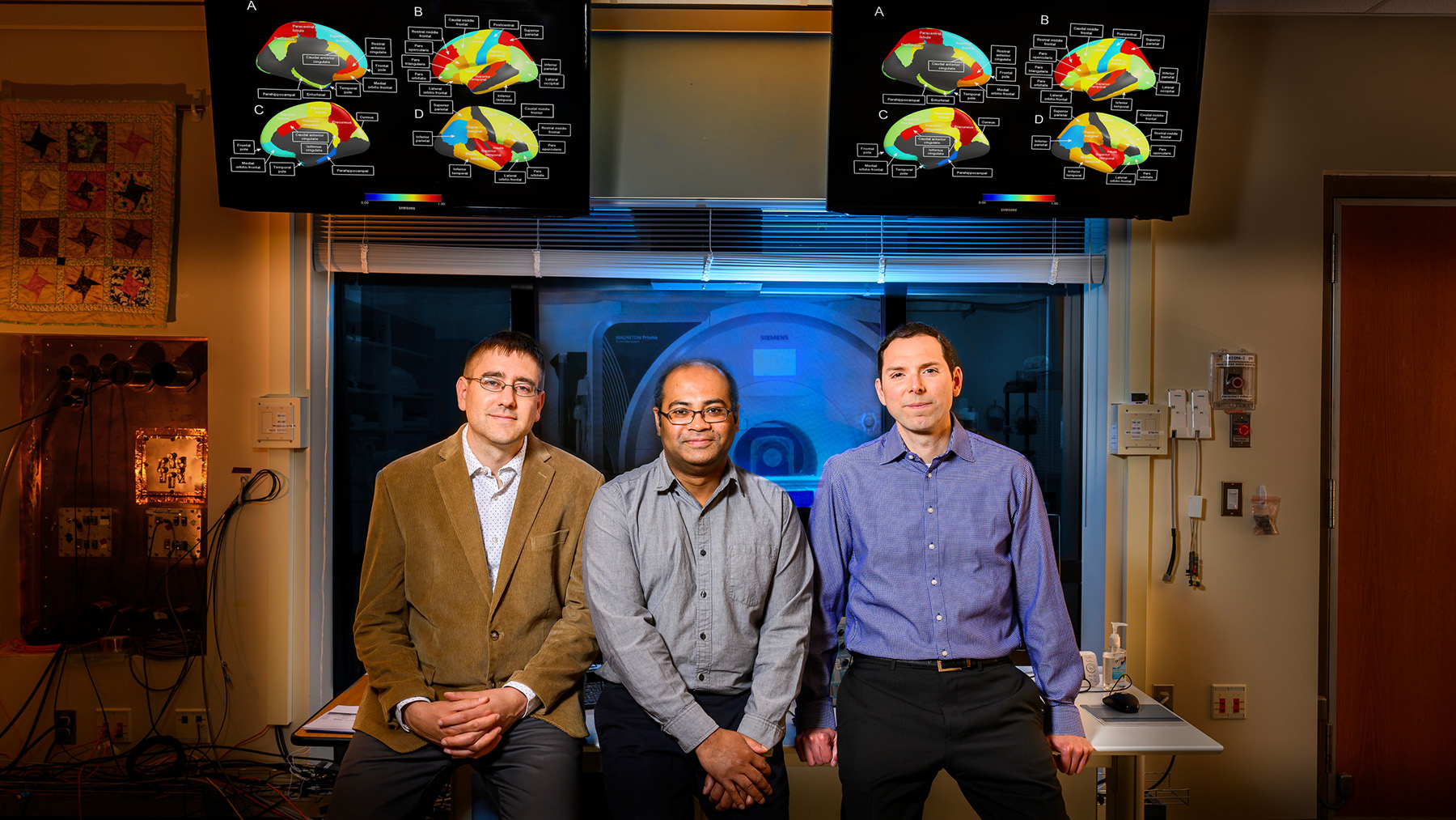 researchers Christopher Zwilling, Tanveer Talukdar and Aron Barbey. Photo by Fred Zwicky