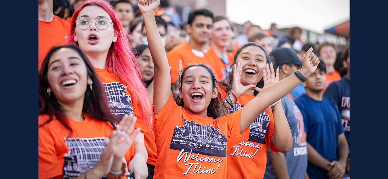 shiny, happy people in orange 'welcome Illini' tee shirts