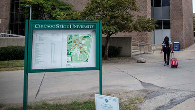signage with map of Chicago State University, one of the schools that could benefit from the state's revised funding plan.