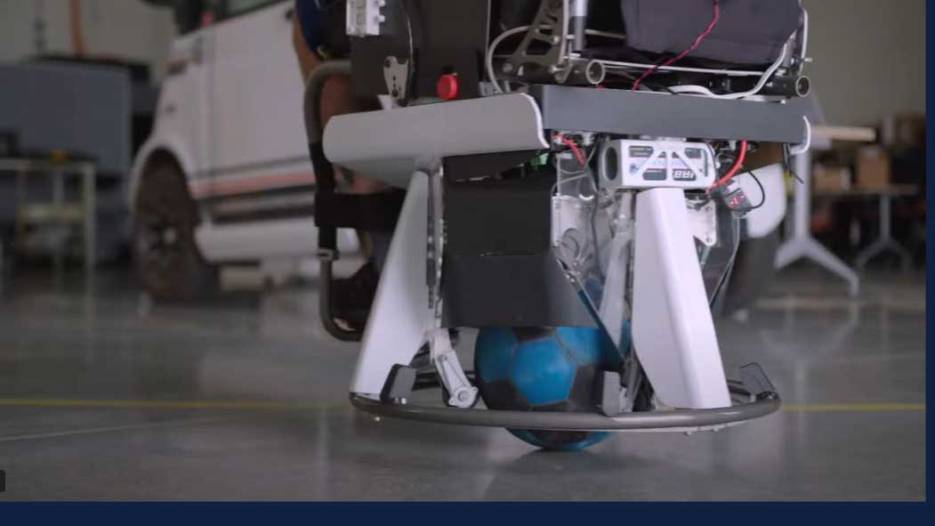 U of I's wheelchair track and field coach Adam Bleakney operates the ballbot wheelchair, which gives him hands-free, lateral movement for the first time.