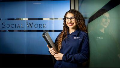 Alum Scarlett Davalos, currently a social worker at Hawthorn School District 73 in Vernon Hills, Illinois, is the student success coach for community college transfer students pursuing degrees through the iBSW program.  Photo by Fred Zwicky