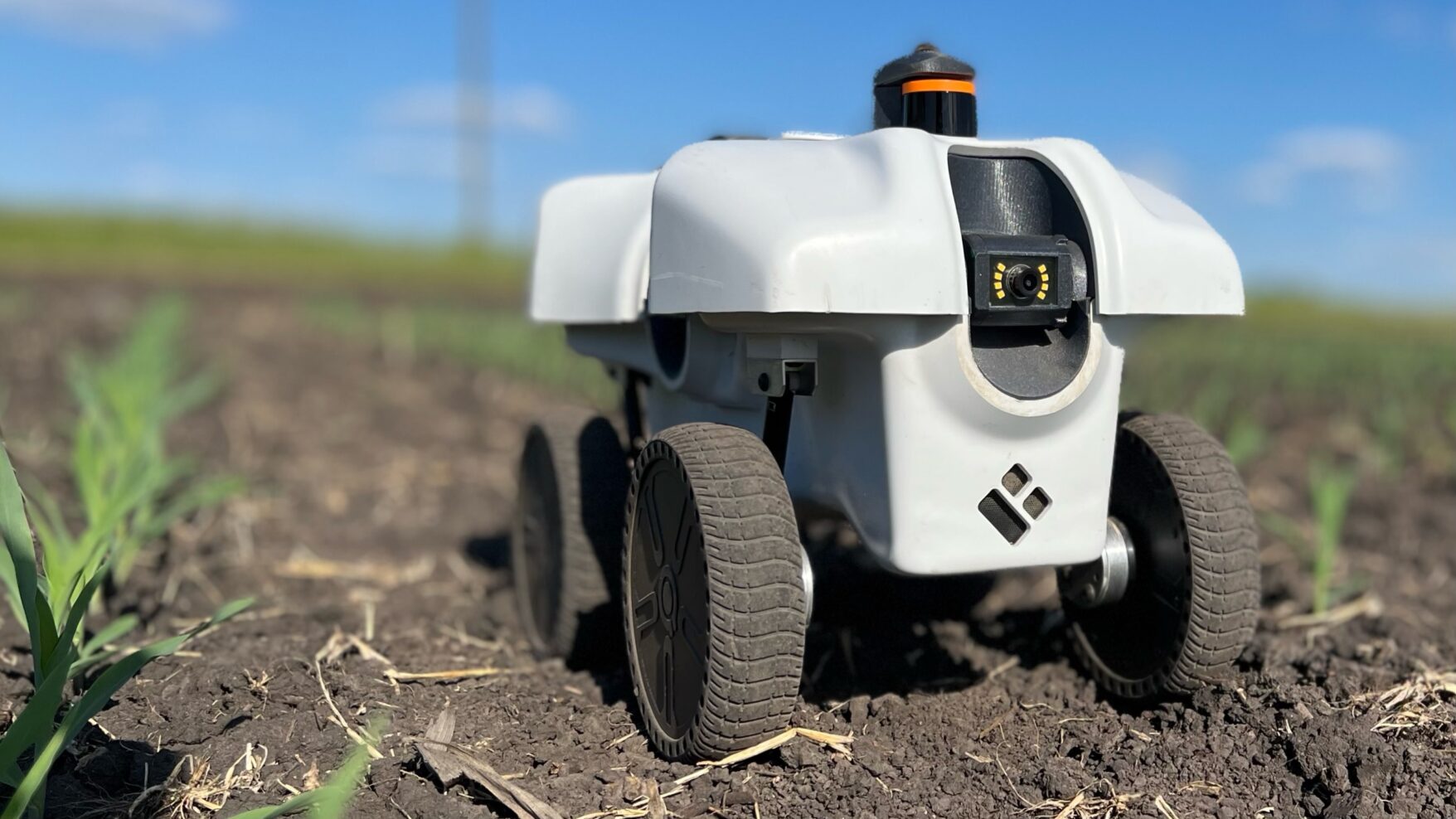 EarthSense TerraSentia robot developed at Illinois that phenotypes and collects data in crop plots.