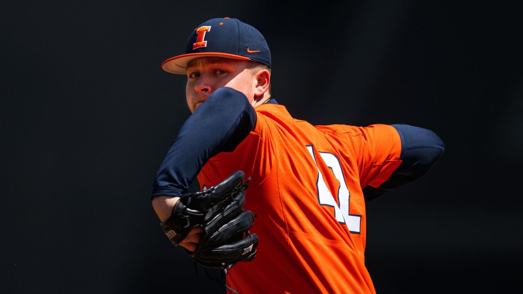 right handed pitcher Riley Gowens in his windup