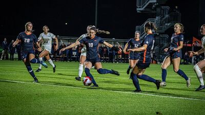 Illini Soccer moves the ball against Purdue in an earlier match.