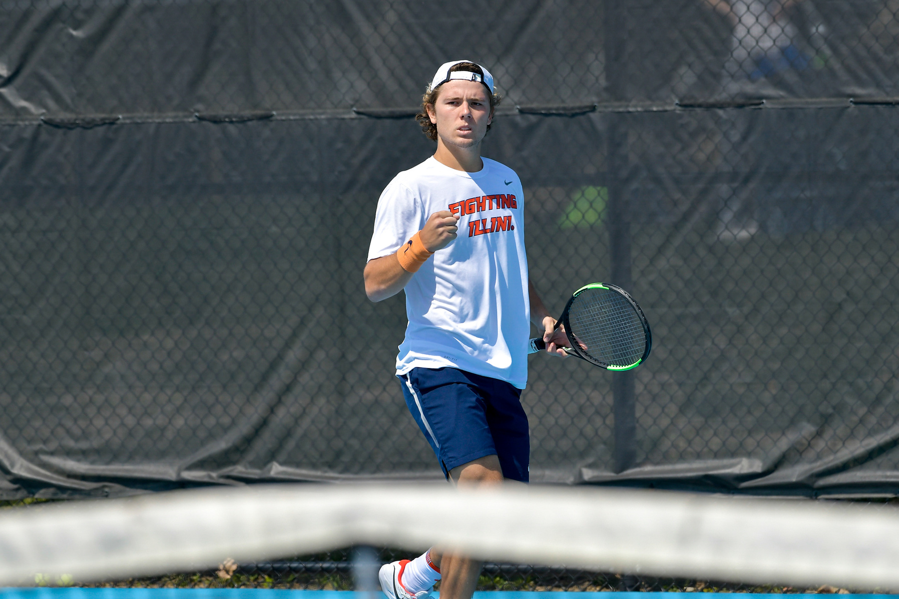 Aleks Kovacevic pumps a fist after winning a point in his match Tuesday
