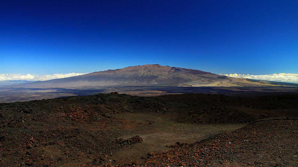 Mauna Kea, a dormant volcano in Hawaii. Native Hawaiians consider the mountain sacred and object to construction on it. Photo via Wikimedia Commons
