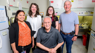 Researchers: Pictured, from front left: postdoctoral researcher Diana Rose Ranoa, graduate student Claire Schane, professor emeritus of biochemistry David Kranz (front center), researcher Amber Lewis and professor emeritus of pathology Edward Roy.  Photo by Fred Zwicky