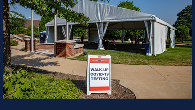 a tent set up on the U of I campus for COVID-19 testing. Photo by Fred Zwicky