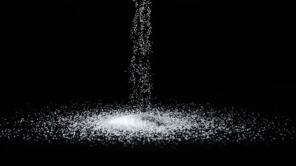 stock image of salt on a black background. Andrei Berezovskii / Getty