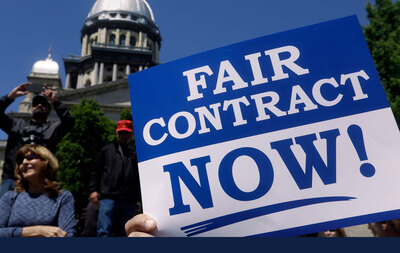 In this 2016 file photo, union supporters rally in front of the Illinois State Capitol against then-Gov. Bruce Rauner's calls to weaken collective bargaining policies. Seth Perlman / Associated Press