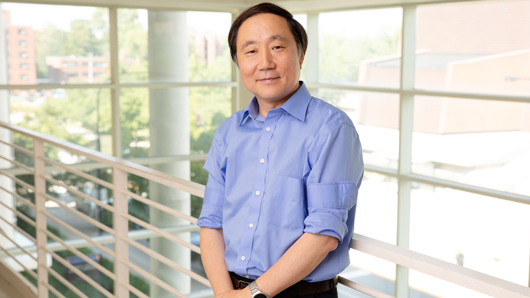 Chemistry professor Yi Lu led a team that developed a technique that allows DNAzymes to cut double-stranded DNA, enabling a wide range of genetic engineering applications.  Photo by L. Brian Stauffer