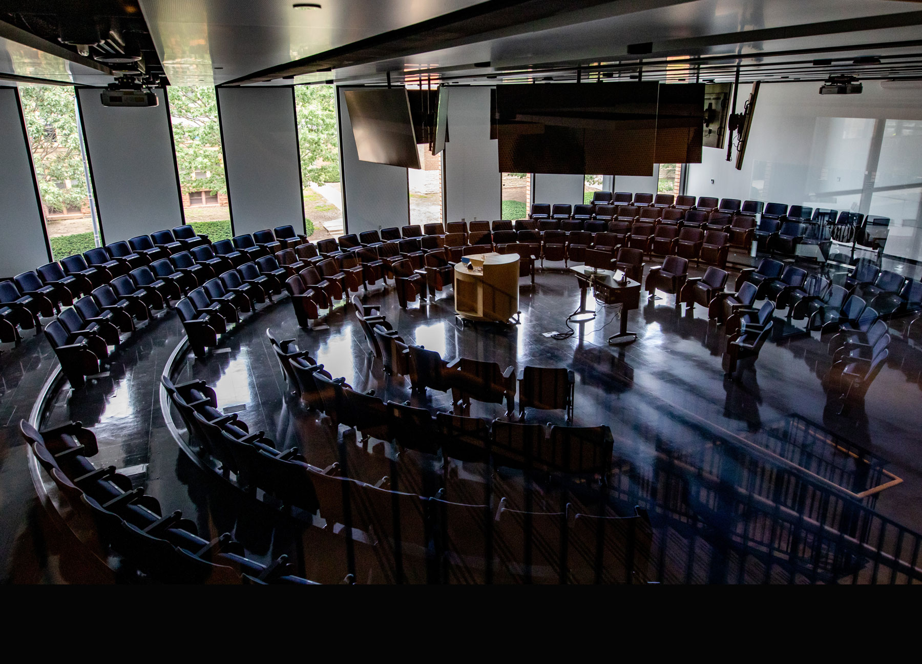 a classroom 'in the round' features large screens and other new technologies. Photo by Fred Zwicky