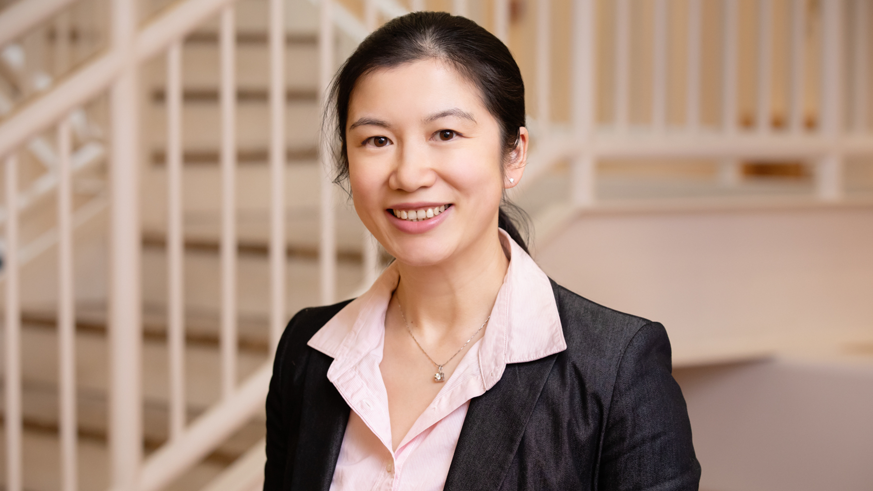 Yilan Xu, a professor of agricultural and consumer economics at Illinois, shows that taming domestic transmission of COVID-19 ought to be prioritized over international travel bans or restrictions aimed at limiting the threat of the virus from abroad.  Photo by L. Brian Stauffer