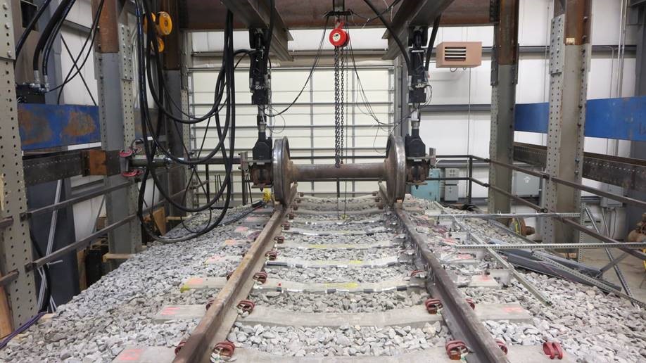 The University of Illinois’ Research and Innovation Laboratory (RAIL) houses multiple testing frames which provide the ability to conduct a variety of industry standard and custom experiments on railway infrastructure and mechanical, such as this Track Loading System.