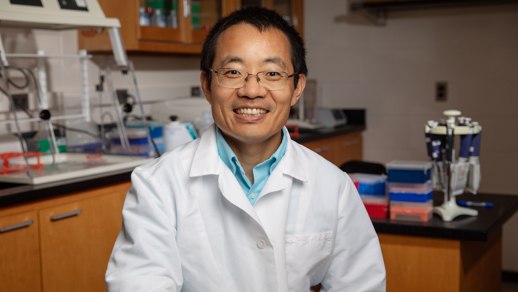 Dr. Leyi Wang and the Veterinary Diagnostic Laboratory have played a key role in diagnosing coronavirus infection in animal species in zoos across the country. Photo by Leslie Stauffer