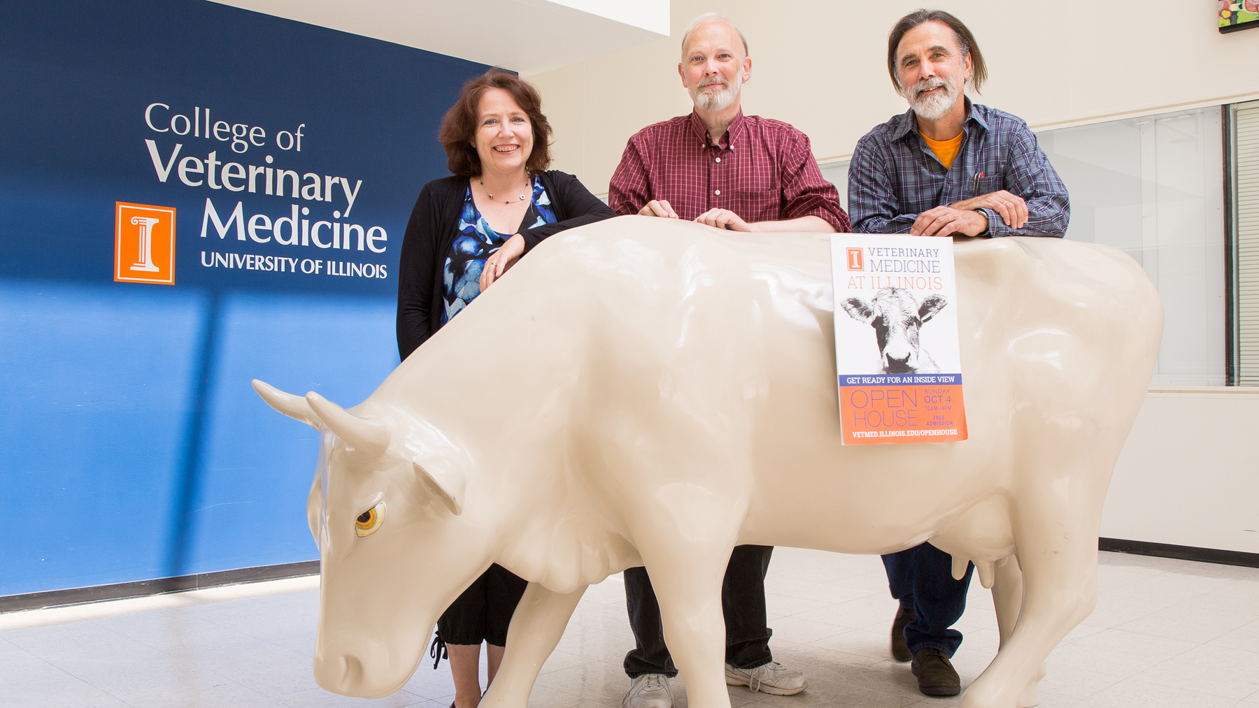 image of  Janet Sinn-Hanlon, Alan Craig and Kerry Helms posing with 'Dr. Moolittle.'