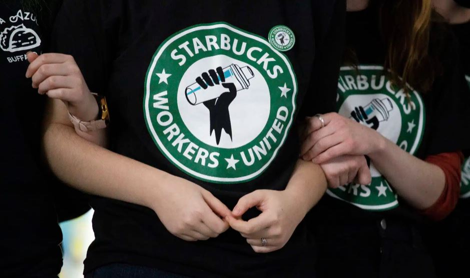 Starbucks employees and supporters react as votes are read during a union-election watch party Dec. 9, 2021, in Buffalo, N.Y. (AP Photo/Joshua Bessex, File)