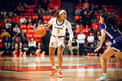 Junior guard Makira Cook brings up the ball against Northwestern. She led the Illini scoring with 23 points.