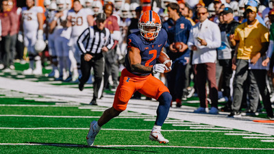 RB Chase Brown, shown in action running with the football, was named to the Associated Press (AP) All-America Team second team