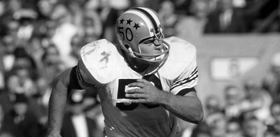 Dick Butkus in action as an Illini