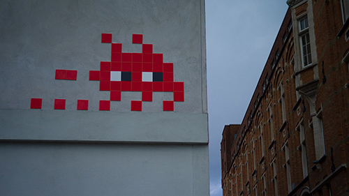 The anonymous and secretive artist Invader has placed more than 4,100 tile images of Space Invader characters around the world. (Photo via Wikimedia Commons.)