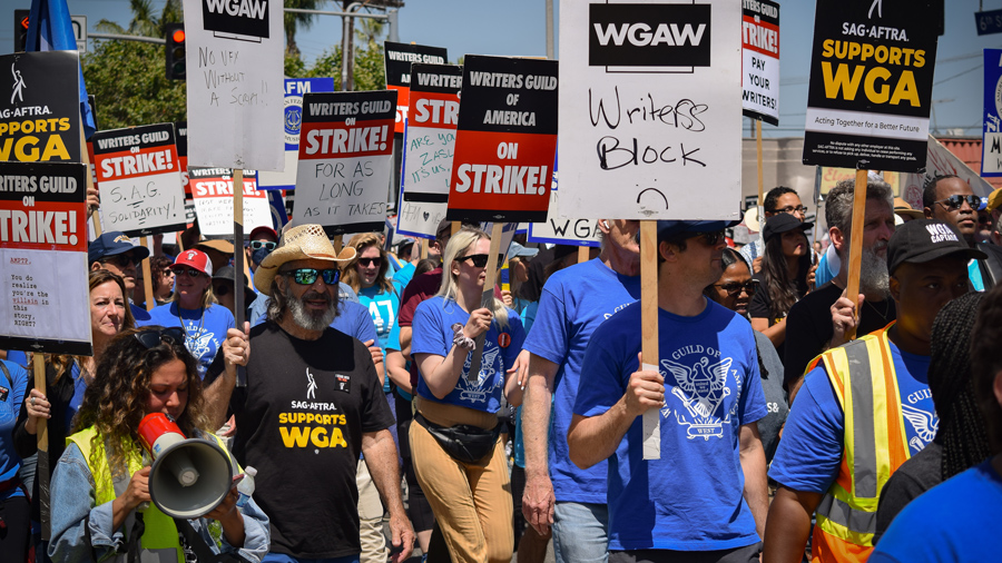 SAG-AFTRA and Writers Guild of America members marching in unison, June 2023. Photo via Flickr by ufcw770
