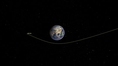 This illustration shows asteroid 2020 QG's trajectory bending during its close approach to Earth. The asteroid is the closest known non-impacting asteroid ever detected. The asteroid passed by 1,830 miles above the southern Indian Ocean on Sunday, Aug. 16, 2020. Image credit: NASA/JPL-Caltech