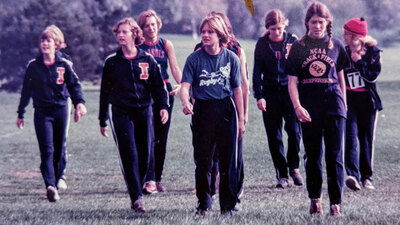 Prior to the lawsuit, Illinois track & field only had resources for approximately 15 uniforms and a travel budget for 12-to-15 women for a sport that fielded 25-to-30 athletes. Archive [hoto shows track team, some members without uniforms.
