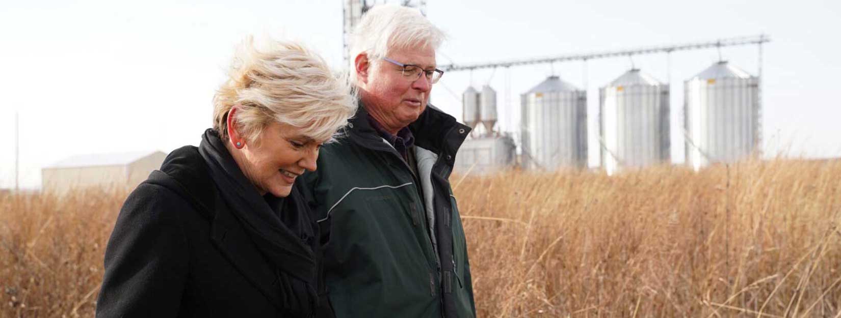 U.S. Secretary of Energy Jennifer M. Granholm, right, visits CABBI fields at the Illinois Energy Farm