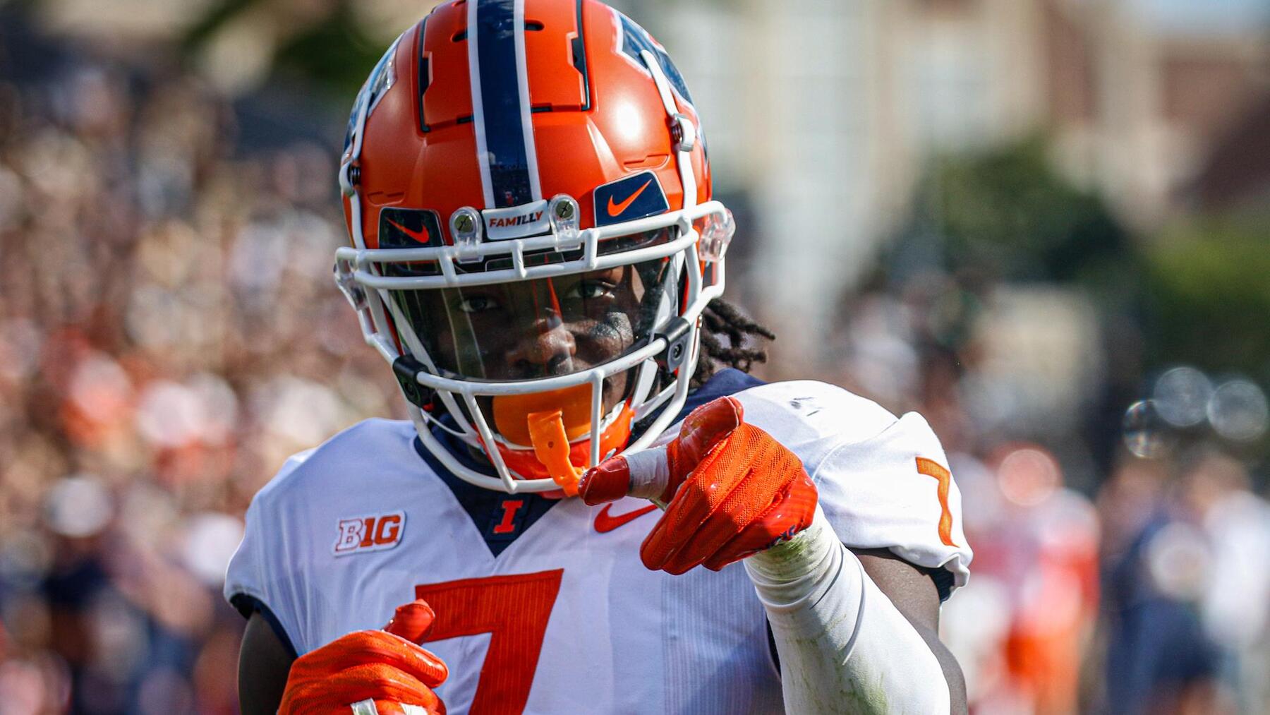 game action close-up photo of Illini Kendall Smith looking at camera and pointing finger