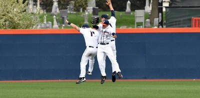 baseball jump in air celebrating win over Northwestern