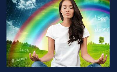 shutterstock image of girl in meditative pose under a rainbow