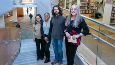 Shuk Han Ng, a visiting research data manager; Giavanna McCall, a graduate student in educational psychology; Ilber Manavbasi, a research staff member; and Liz Stine-Morrow, a Professor Emerita in educational psychology on a visit to the Champaign Public Library