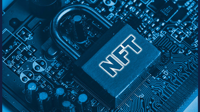 NFT intials on metallic lock that sits on computer board. Image by Marco Verch via Wikimedia Commons