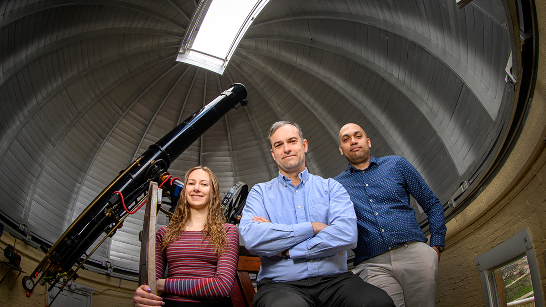 Undergraduate graduate student Lily Kettler, left, professor Joaquin Vieira and graduate student Kedar Phadke are part of an international team that detected complex organic molecules in a galaxy more than 12 billion light-years from Earth. Photo by Fred Zwicky
