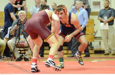 illini wrestler preparing to grapple with an opponent