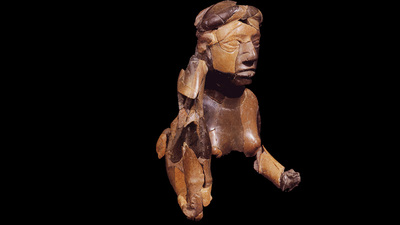 upper torso and head of a red goddess sculpture, carved from stone and found at the ancient American Indian city of Cahokia. Photo courtesy Illinois State Archaeological Survey