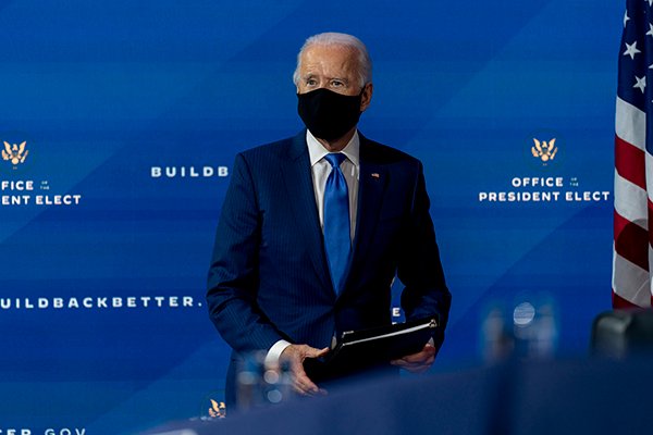 President-elect Joe Biden departs a news conference after introducing his nominees and appointees to economic policy posts  Dec. 1 in Wilmington, Del. (AP Photo by Andrew Harnik)