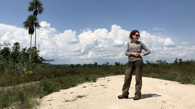 1.	U. of I. graduate student Jeannie Larmon surveys the landscape before the trek. Photo by Thomas Franklin